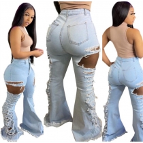 Distressed high-rise denim flared pants with ripped sides A3268
