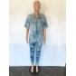 Sexy and fashionable wash, tie, flower, and float denim jumpsuit JLX7500